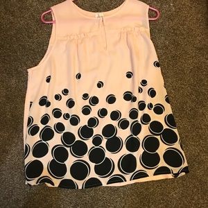 Light pink sleeveless blouse